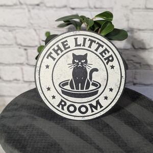 The Litter Room' round metal sign black cat design